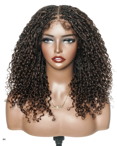 Mannequin head with a curly brown wig on a white background